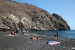 Perissa black sand beach in Santorini